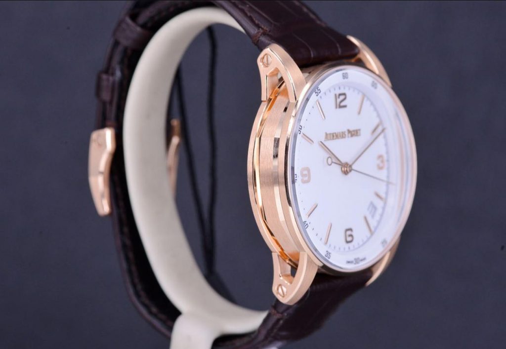 The brown leather straps fake watches are made from 18k rose gold.